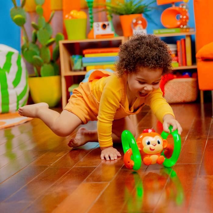 BRIGHT STARTS Petit singe Roll & Glow